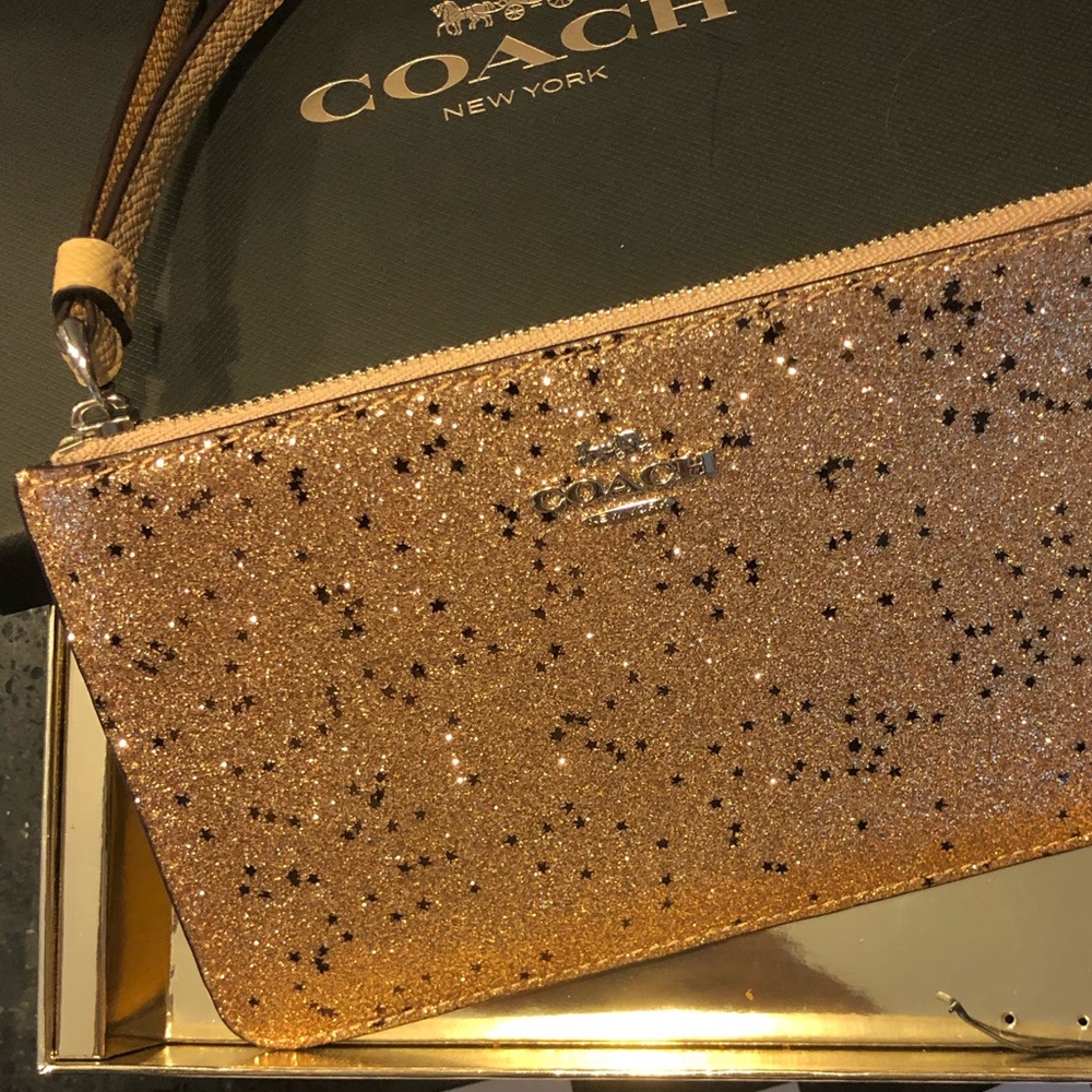 NIB COACH rose gold star glitter wristlet